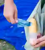 Porta Saquinho e Álcool em Gel